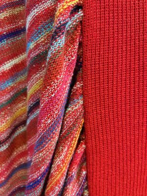 Detail. Hand loomed knit dress with draping. Vivian Chan Shaw